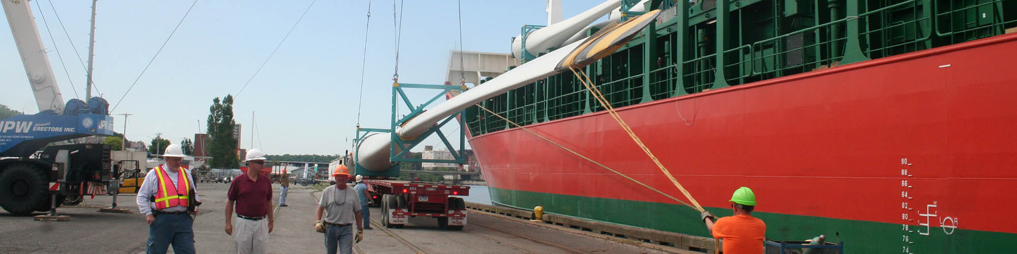 windmill blades being unloaded from a ship at the Port of Oswego